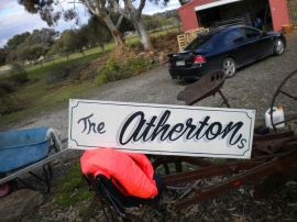 Dad's proof that I broke the sign.