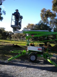 Driving the cherry picker.