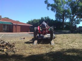I was documenting the tractor purchase, not waiting for dad to topple...