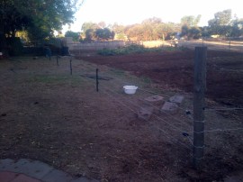 The fence moved back.