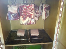 Smoking our first batch of bacon.