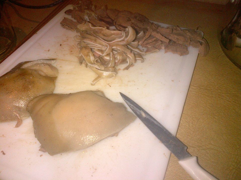 The ears cut into thin strips and the cheeks ready to be cut/torn up.