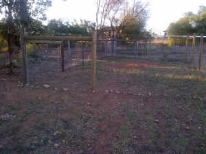 You can see the row of rocks down the bottom holding the wire down.