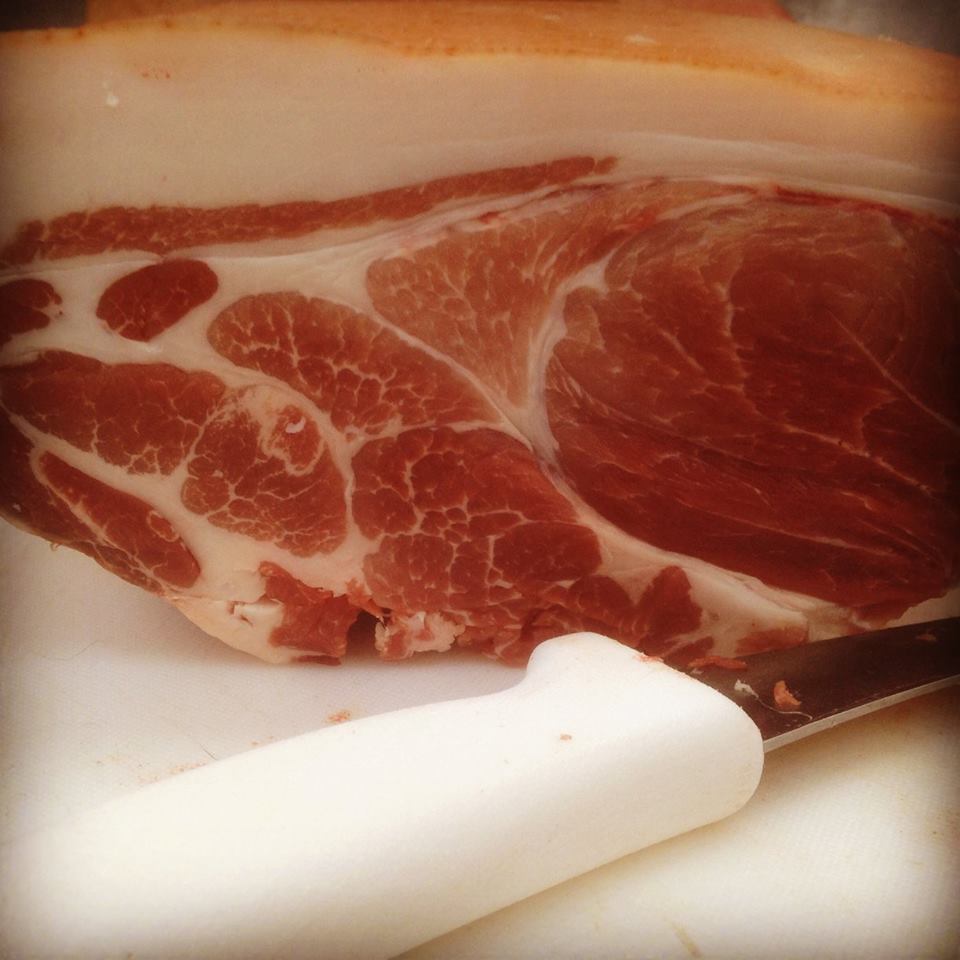 Look at the colour and marbling. You will *never* get meat like this from intensively-farmed pork.