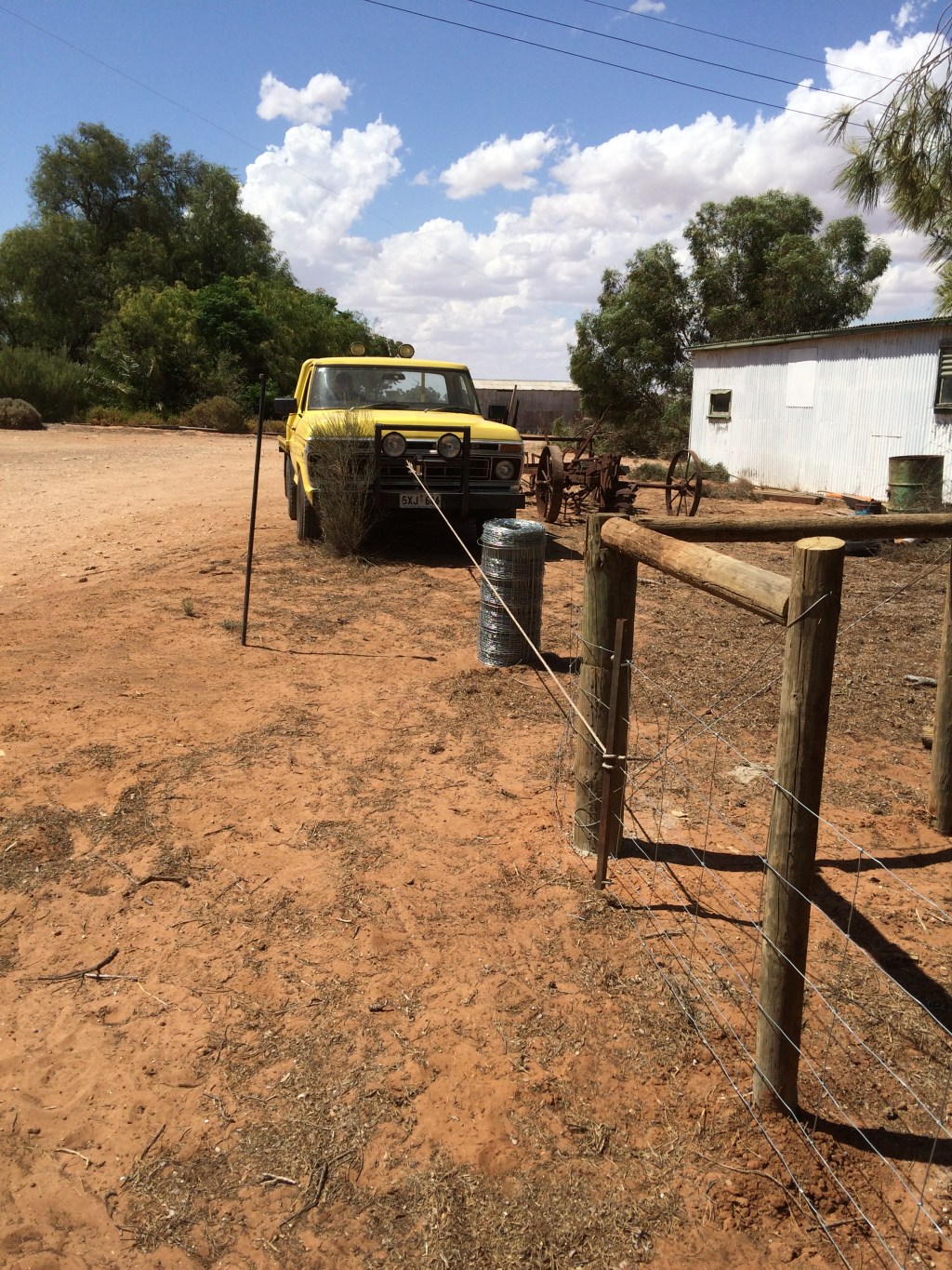Farmgenuity is using a triple truckies' hitch to pull the panel up tight. Impatience is putting the F100 into reverse to get it that bit tighter.