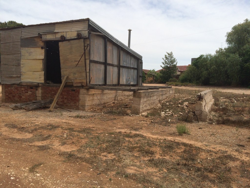 This looks dodgy, but is awesome. It's an old fuel shed/depot.  It's perfect for storing grain - just back the Ranger up and cart the bags on/off.